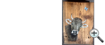 Vache et papillon bleu