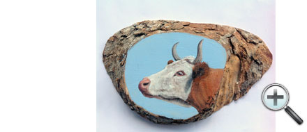 Tête de vache sur bois