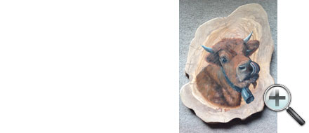 Tête de vache sur bois