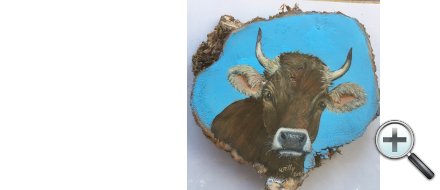 Tête de vache sur bois